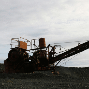 Heavy machinery operating in a mining environment.