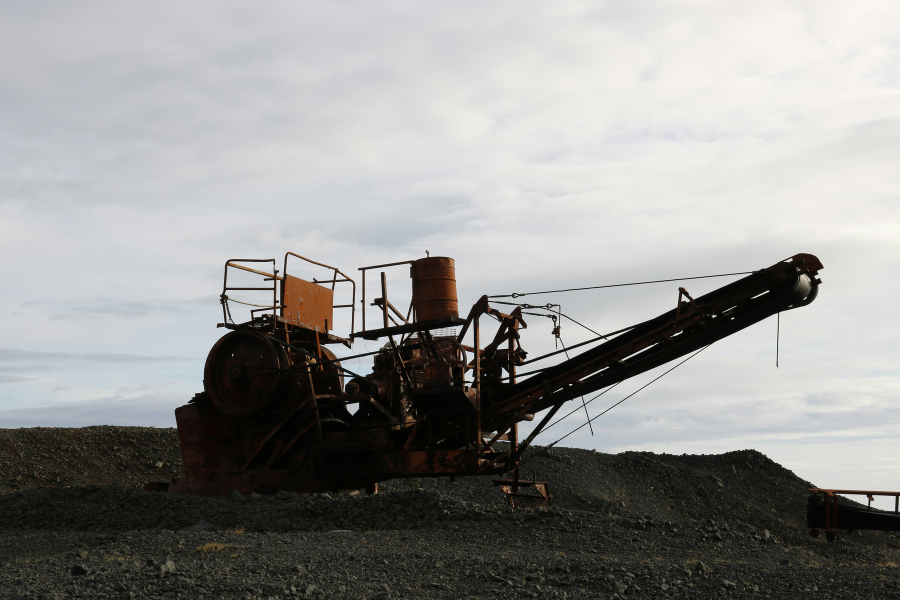 Heavy machinery operating in a mining environment.