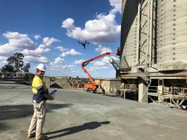 Mining industry drone pilot carrying out an asset inspection on site in Western Australia